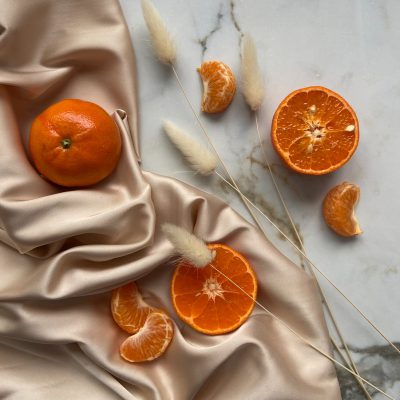 oranges and tangerine on textile